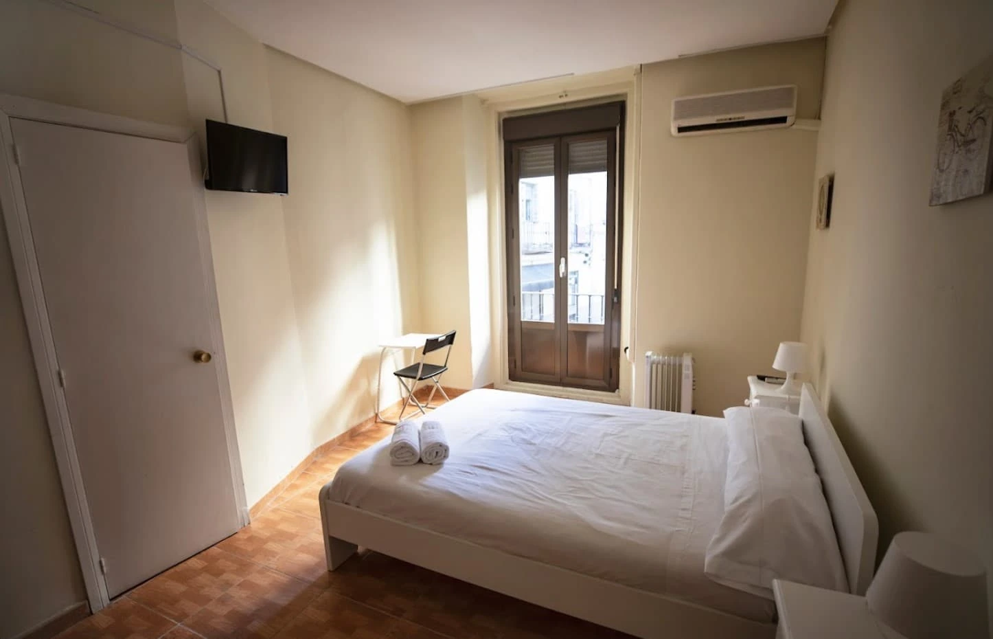 Double Room with a double bed, TV and balcony
