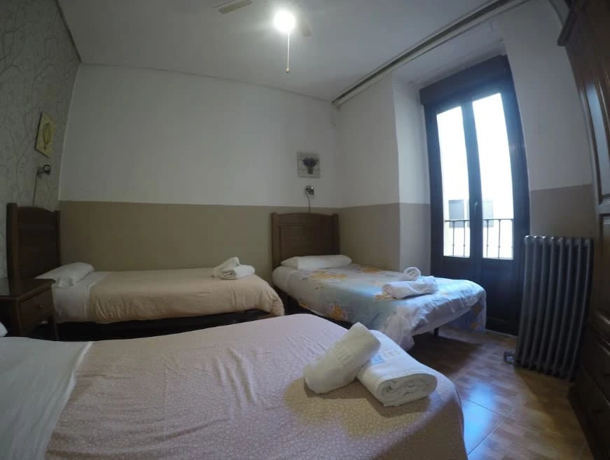 Triple Room with a balcony and radiator